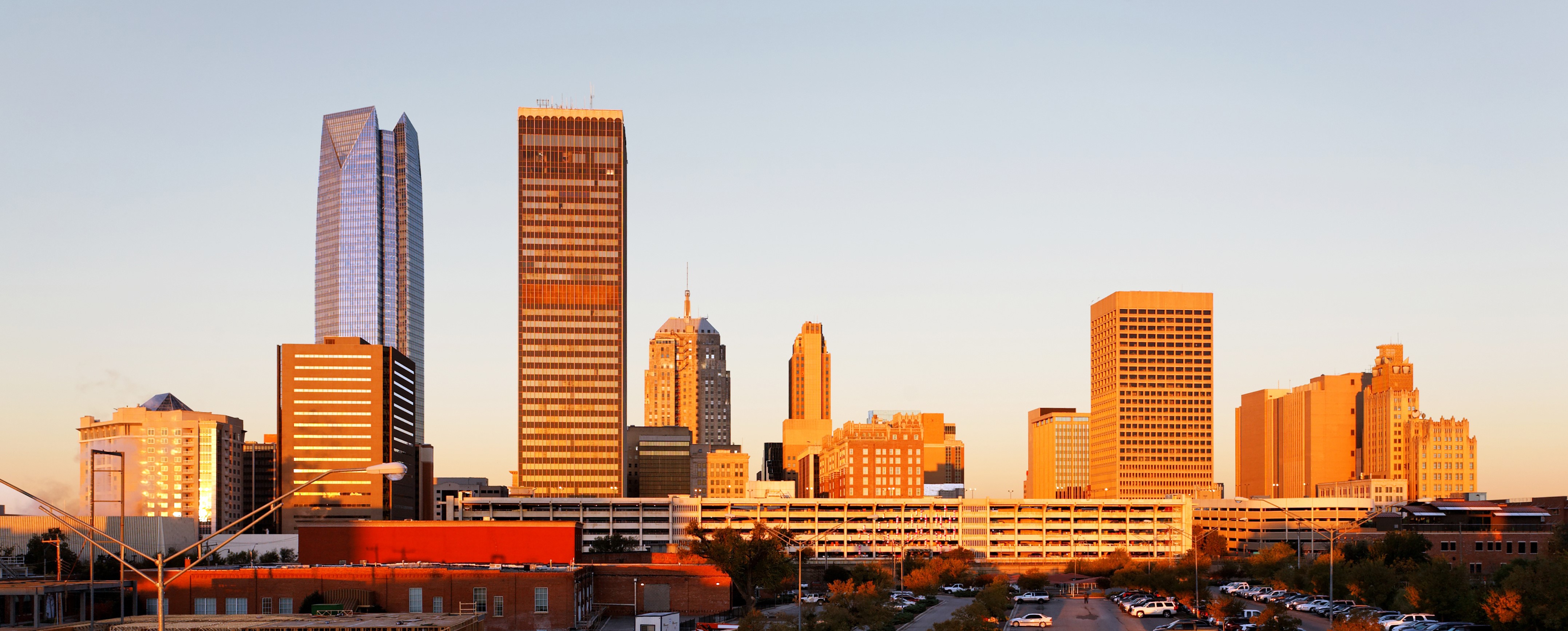 The skyline of Oklahoma City as the sun sets.