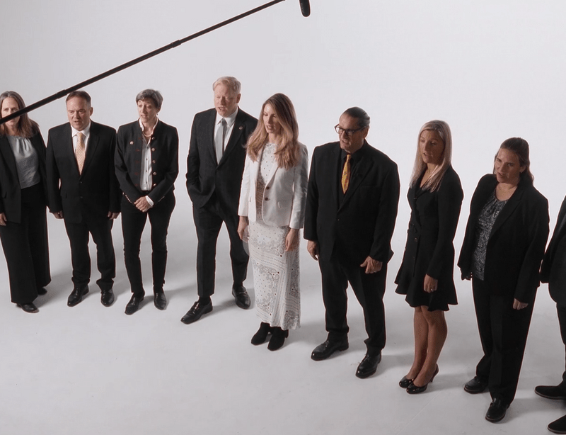 Military lawyers and legal defense team of Will M. Helixon law office posing in professional studio