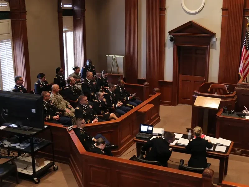 Court-martial panel receives instructions during a mock sexual assault court martial