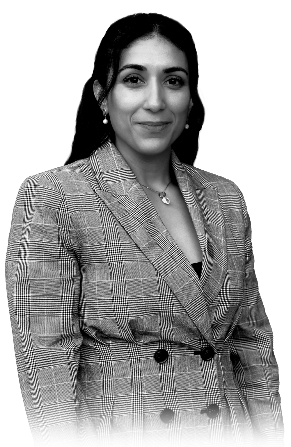 Linda Aguilera smiling, wearing a double-breasted glen plaid blazer, black-and-white portrait