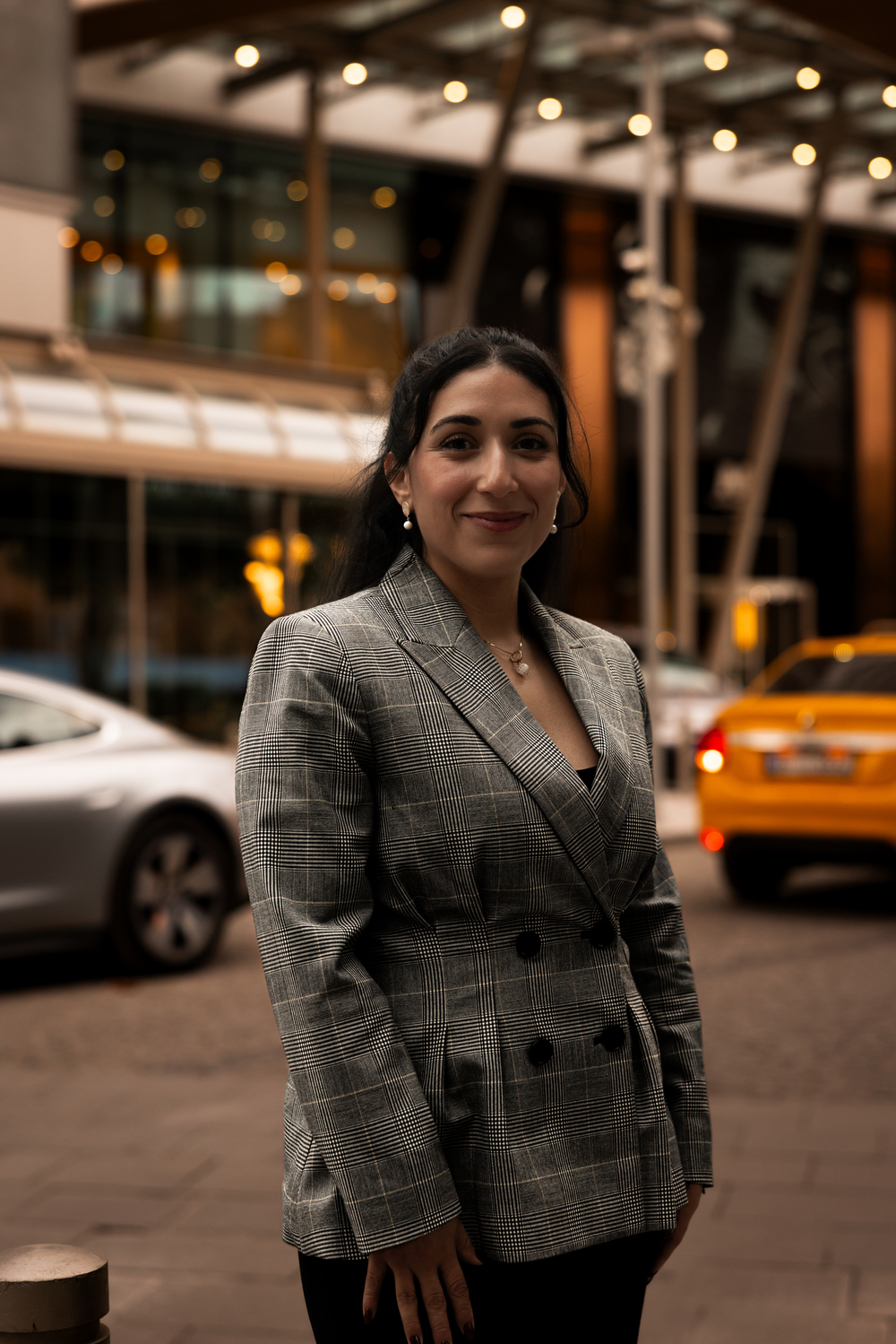 Military lawyer Linda Aguilera smiling at a slight angle on a city street in Izmir, Turkey
