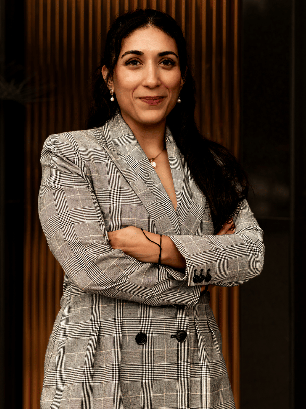 Military defense lawyer Linda Aguilera with arms crossed, photographed at a slight angle
